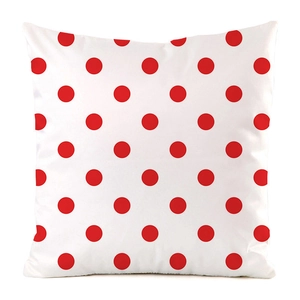 Detail view of the soft faux silk cushion cover featuring classic red polka dots