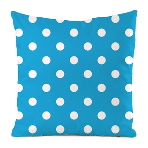 Macro detail of high-saturation blue cushion cover with white polka dots for home decor
