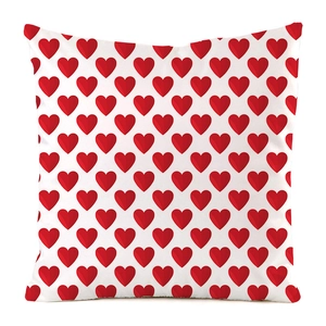 Detailed view of square pillowcase featuring a 3D red heart pattern on white faux silk fabric