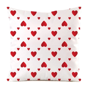 Detail shot of the red heart pattern on white faux silk decorative pillowcase