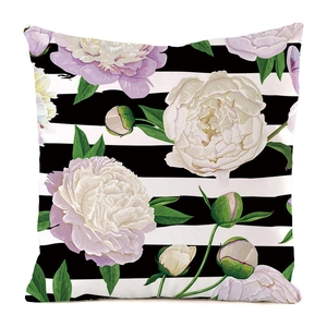 Detail of striped pillow cover with hand-painted white and purple peony floral patterns