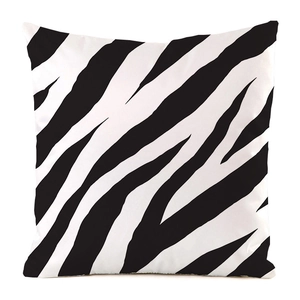 Detail of square zebra print pillow cover with black and white faux silk animal texture