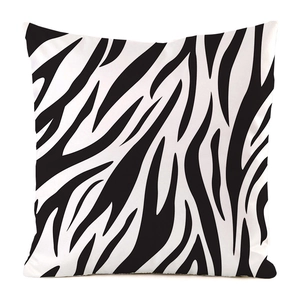 Close-up of modern faux silk pillow cover with black and white zebra pattern textures