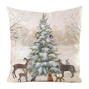 Detail showing forest animals and a snowy Christmas tree on a soft square cushion cover