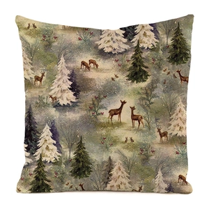 Detail of square festive cushion cover with reindeer and snowy forest motif on linen fabric