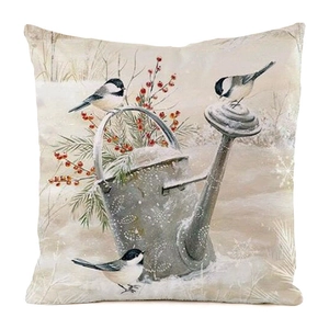 Close-up of a square winter pillowcase featuring birds, berries, and pine branch print