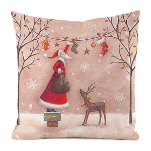 Detail of Christmas pillowcase featuring Santa and reindeer in a snowy forest scene