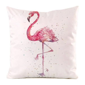 Macro view of watercolor flamingo design and silk-like fabric texture on cushion cover