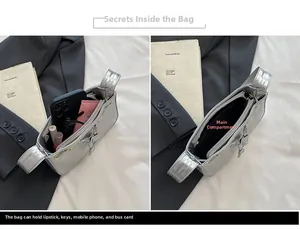 Internal view showing the spacious main compartment of the silver metallic shoulder bag