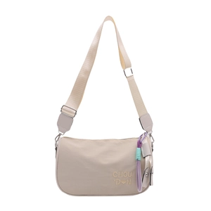 Minimalist beige crescent underarm bag with adjustable strap and colorful pendant
