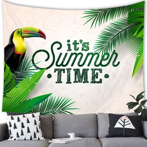 Detail showing tropical summer wall tapestry with toucan and palm leaf print above a sofa