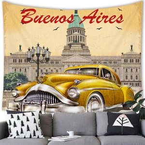 Retro Buenos Aires wall tapestry featuring a vintage yellow car over a modern grey sofa