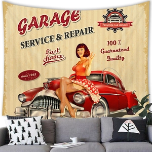 Detail of vintage garage tapestry featuring a retro red car and pin-up girl poster