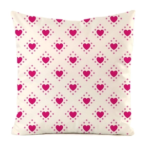 Vue détaillée du motif de cœurs roses et de pois sur la housse de coussin carrée en soie