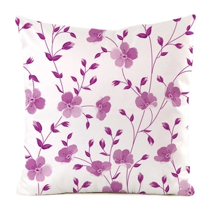 Close-up of elegant purple floral patterns on white faux silk decorative cushion cover