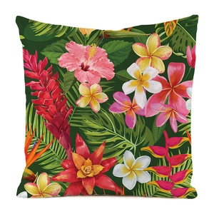 Gros plan détaillé sur l'imprimé de feuilles de palmier et fleurs d'hibiscus sur la housse