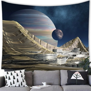 Sci-fi outer space tapestry with planets and nebulae hanging above a grey sofa