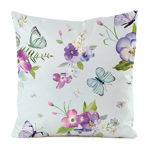 Detail of light blue floral pillow cover with pansies and butterflies on silk texture