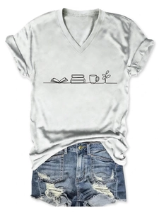Detailed flat lay of white V-neck T-shirt with book and cup print and denim shorts