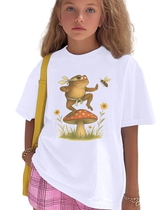 Detailed view of kung-fu frog and mushroom print on kids' white cotton t-shirt
