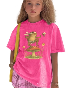 Close-up of pink cotton t-shirt with kung fu frog sitting on a mushroom illustration