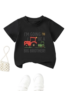 Detail of kids black cotton T-shirt featuring cartoon tractor and Big Brother lettering