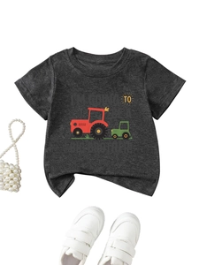 Flat lay of a grey big brother t-shirt with tractor print and white sneakers