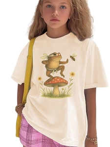 Close-up of a funny kung fu frog standing on a red mushroom on this cream cotton t-shirt