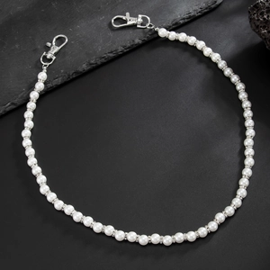 Men's pearl trouser chain with rhinestone spacers and silver lobster clasps on black stone