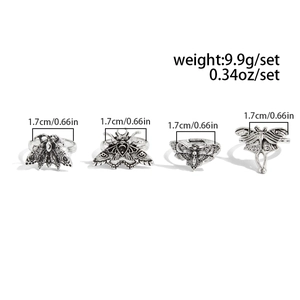 Detailed size and weight specs for vintage silver moth and skull gothic ring set