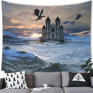 Fantasy dragon and castle tapestry wall hanging above a modern sofa in a cozy living room