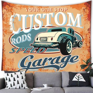 Detailed view of an American vintage car style wall tapestry hung above a living room sofa