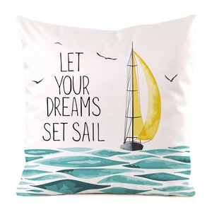 Detailed view of sailboat print on faux silk cushion cover with Let Your Dreams Set Sail text