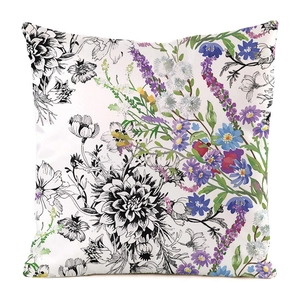 Detail view of square pillowcase with artistic black white and colorful floral pattern