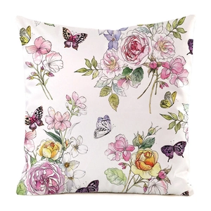 Detail of floral and butterfly watercolor print on white faux silk cushion cover