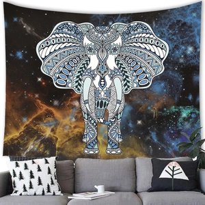 Detailed texture of cosmic elephant tapestry hanging over a sofa in a living room