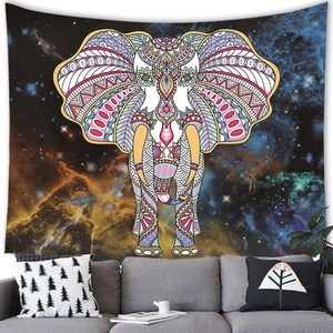 Detailed view of bohemian mandala elephant tapestry with galaxy nebula background