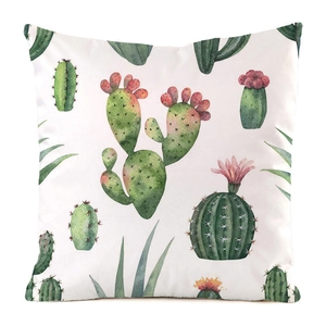 Detailed view of watercolor cactus patterns on a square white cushion cover
