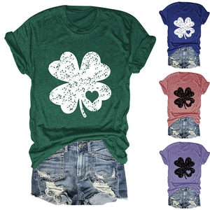 Detail view of women's round neck T-shirt featuring four-leaf clover heart print