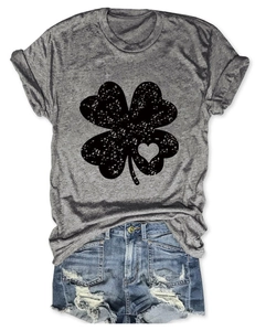 Detail of grey heather t-shirt with a vintage black four-leaf clover and heart print