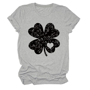 Detail of grey crewneck T-shirt featuring a textured clover and heart graphic print