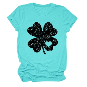 Detail of mint green cotton t-shirt with distressed black four-leaf clover heart print