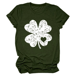 Macro shot of a dark green t-shirt featuring a white distressed four-leaf clover heart