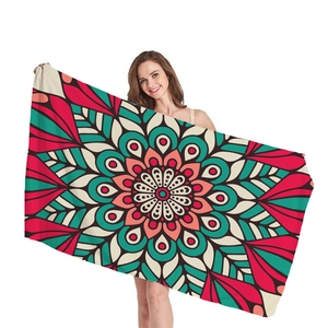 Ethnic mandala geometric patterned microfiber beach towel with magenta and teal details