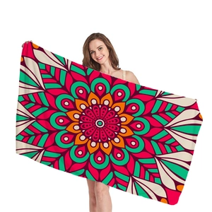 Ethnic mandala geometric pattern beach towel with thick fabric in red and teal colors