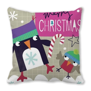 Detail of Christmas pillow cover with cartoon penguin and Merry Christmas print