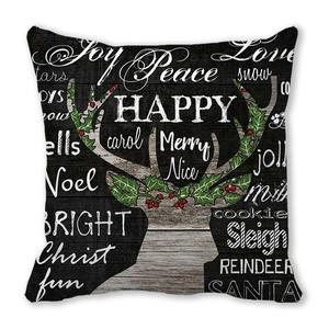 Détail d'une silhouette de renne de Noël avec motif de houx sur la housse de coussin