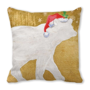Détail de la housse de coussin de Noël avec un ours polaire et des flocons dorés