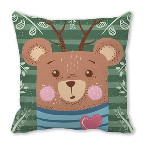 Close-up of decorative pillowcase with cartoon bear in reindeer antlers and blue stripes