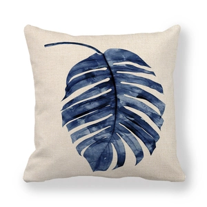 Detailed texture of linen fabric featuring a blue watercolor palm leaf print